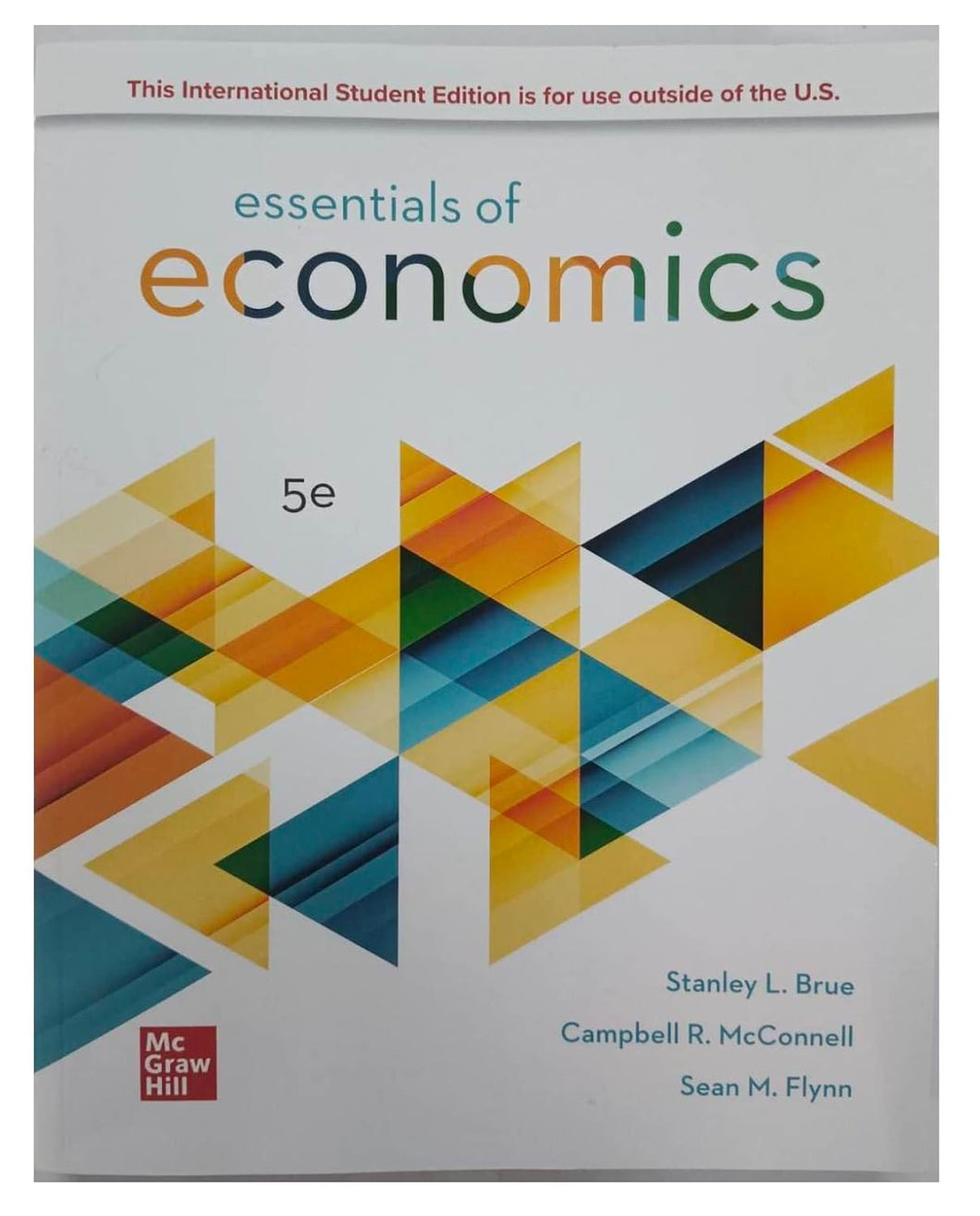 ISE Essentials of Economics Paperback – April 11, 2022